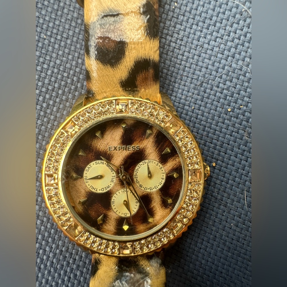 Express cheetah print watch with good detailing